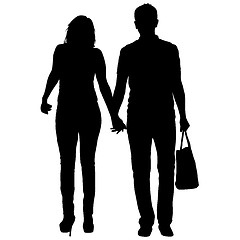 Image showing Silhouette man and woman walking hand in hand