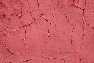 Image showing Old shelled red painted wall