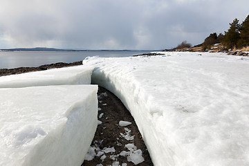 Image showing Lumps of ice on the shore of the northern sea