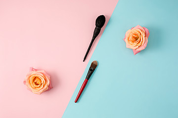 Image showing Make up brushes on colorful background