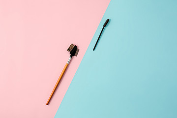 Image showing Make up brushes on colorful background