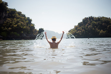 Image showing Woman in swimsuit standing on sea