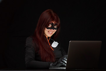 Image showing Burglar in mask at night