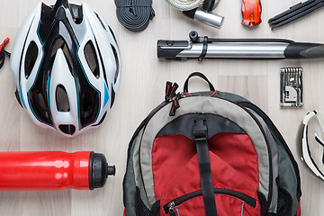 Image showing Cyclist accessories on wooden background