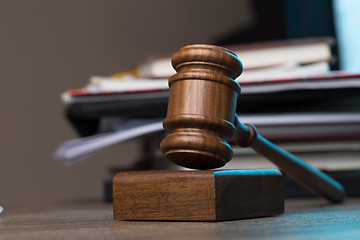 Image showing Judge\'s hammer lies on table