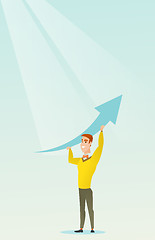 Image showing Business man holding arrow going up.