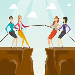 Image showing Two groups of business people pulling rope.