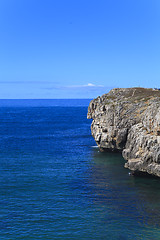 Image showing Rocky Coast Extending into the Sea