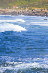 Image showing Rocky Coast Extending into the Sea