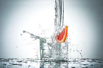 Image showing water splash in glass of gray color