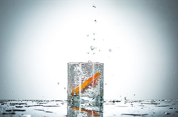 Image showing water splash in glass of gray color