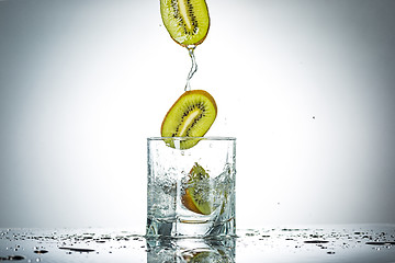 Image showing water splash in glass of gray color