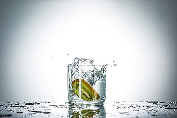 Image showing water splash in glass of gray color