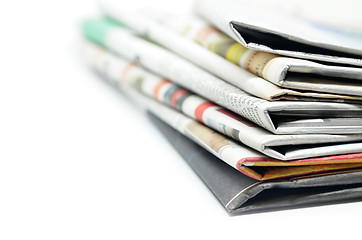 Image showing Newspapers folded and stacked