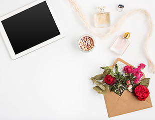 Image showing Top view of white office female workspace with laptop