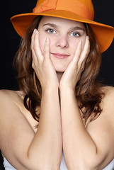 Image showing woman with orange hat