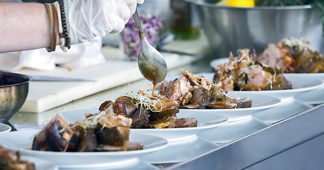 Image showing Preparing meat on the table