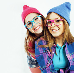 Image showing best friends teenage girls together having fun, posing emotional on white background, besties happy smiling, lifestyle people concept close up