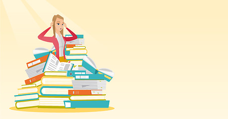 Image showing Student sitting in huge pile of books.