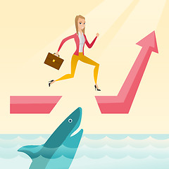 Image showing Business woman jumping over ocean with shark.