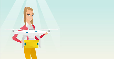 Image showing Woman controlling delivery drone with post package