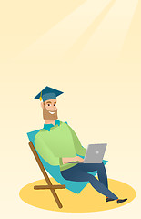 Image showing Graduate sitting in chaise lounge with laptop.