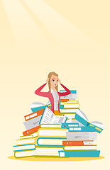 Image showing Student sitting in huge pile of books.