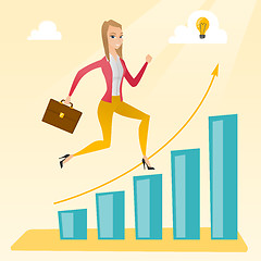 Image showing Business woman standing on growth graph.