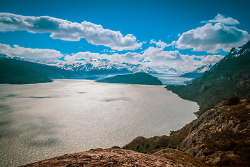 Image showing Sea surrounding mountains