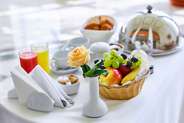 Image showing delicious breakfast for two at the luxury hotel.