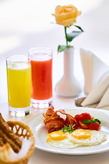 Image showing delicious breakfast for two at the luxury hotel.