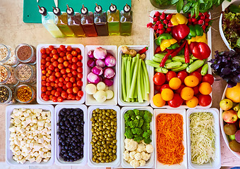 Image showing Salad Bar Fresh Vegetables sliced Top view Tomato Carrot Celery Cucumber Cherry tomato Sweet pepper.