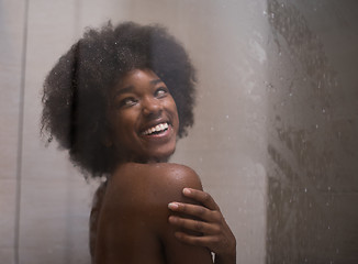 Image showing African American woman in the shower