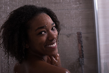 Image showing African American woman in the shower