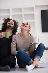 Image showing young couple in their new home