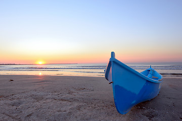 Image showing Fishing boat and sunrise 