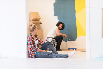 Image showing young couple doing home renovations