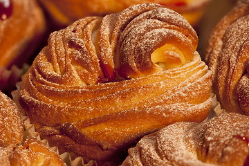 Image showing American cruffins with jam background