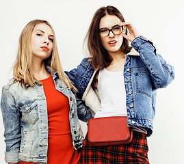 Image showing best friends teenage girls together having fun, posing emotional on white background, besties happy smiling, lifestyle people concept close up