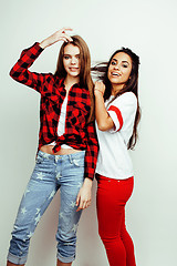 Image showing best friends teenage girls together having fun, posing emotional on white background, besties happy smiling, lifestyle people concept, blond and brunette multi nations 