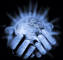 Image showing Globe in a girl's hands