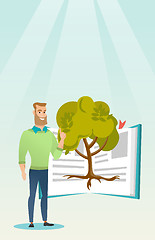 Image showing Student pointing at tree of knowledge.