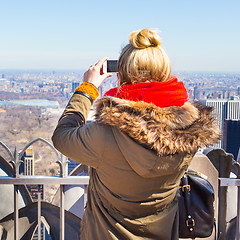 Image showing Tourist taking photo of New York City.