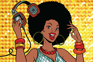 Image showing African American woman DJ with headphones