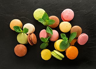 Image showing Macarons on stony table