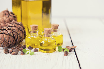 Image showing The cedar oil in a glass bottle