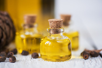 Image showing The cedar oil in a glass bottle