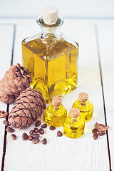 Image showing The cedar oil in a glass bottle