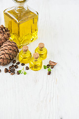 Image showing The cedar oil in a glass bottle