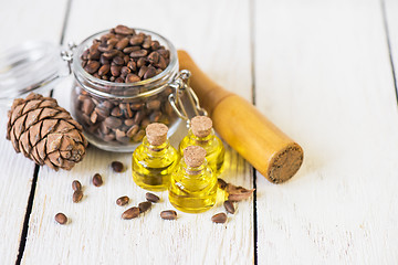 Image showing The cedar oil in a glass bottle